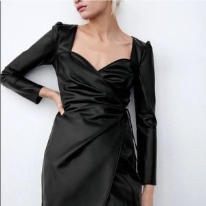 FAUX LEATHER CROSSOVER DRESS